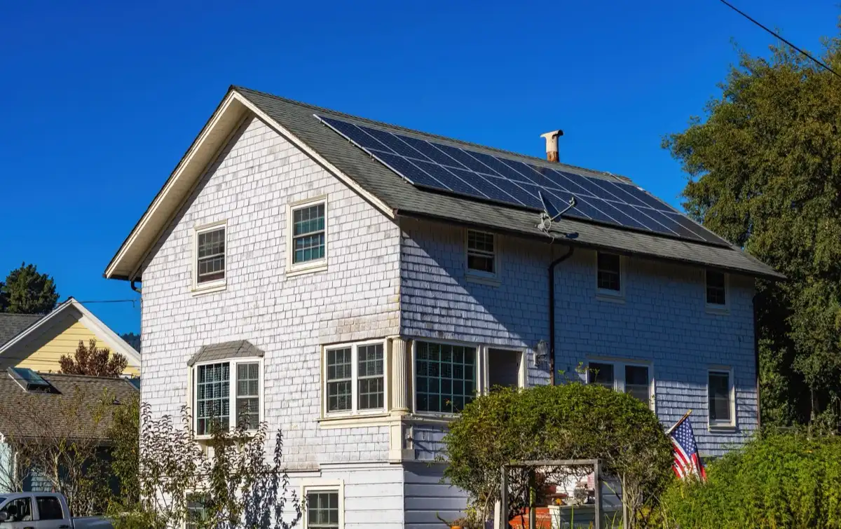 Shingle roof on a house in Modesto, CA, where a leak claim turns on whether the roof was broken or simply worn out